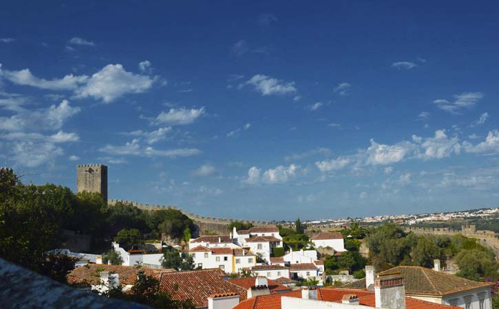 View of the medieval town of Óbidos and its walls – Tours in Castelo Branco
